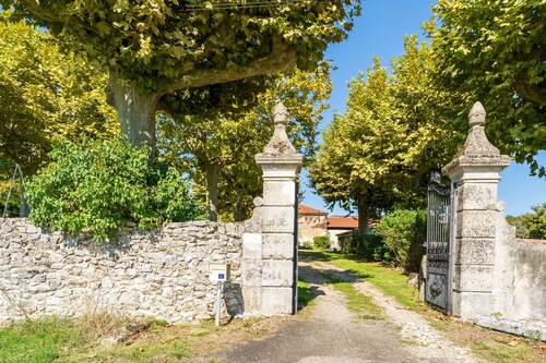 In One Wing of a Former Manor House
