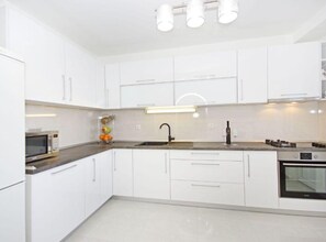 Apartment (Three Bedroom Apartment With Terrace) | Private kitchen | Fridge