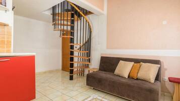 Apartment (One Bedroom Apartment With Terrace (A) | Living room | 32-inch flat-screen TV with cable channels