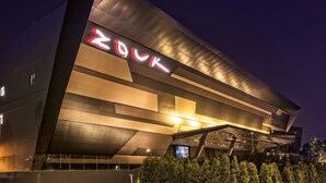 A modern building with a prominent 'Zouk' sign on the facade. - A Stylish High Floor 3BR Apt at Bukit Bintang (Kuala Lumpur)