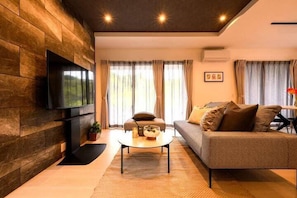 Villa, 4 habitaciones | Área de sala de estar