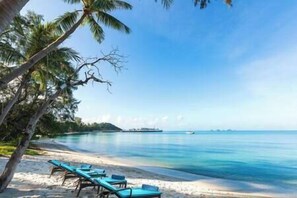 Beach nearby, sun loungers