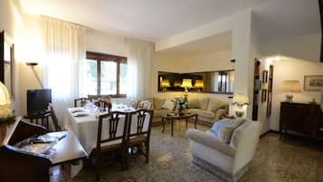 Villa, Patio, Garden View | Living area | 32-inch flat-screen TV with digital channels