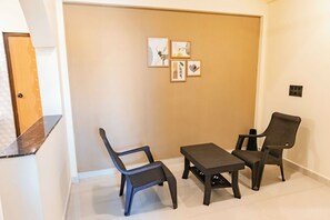 Apartamento luxo, sacada, vista para a colina | Área de estar | Impressoras