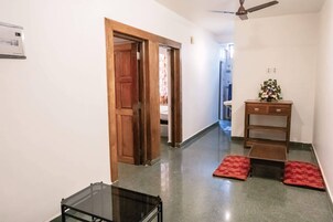 Family Apartment, Balcony, City View | Living area | Printers