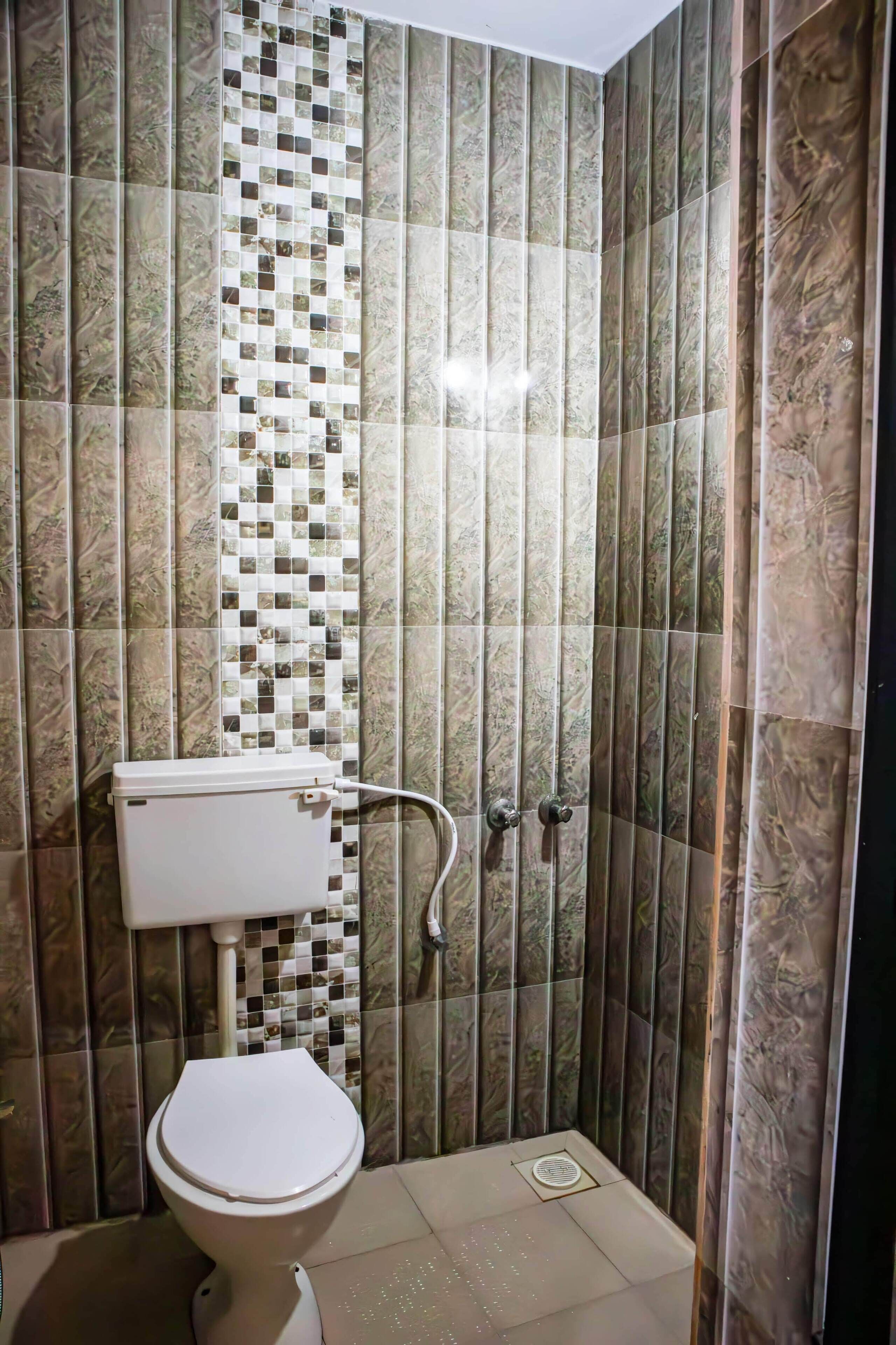 Family Apartment, Balcony, City View | Bathroom | Shower, hair dryer, towels, soap