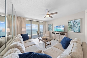 Signature Condo, 3 Bedrooms, Pool View, Beachfront | Living room | 55-inch Smart TV with digital channels