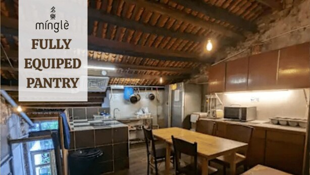 A fully equipped pantry with wooden cabinets, a sink, and a microwave. - Mingle Highstreet (Kuala Lumpur)
