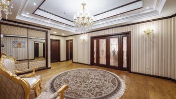 Apartment, 3 Bedrooms, Balcony, City View | In-room safe, desk, laptop workspace, soundproofing