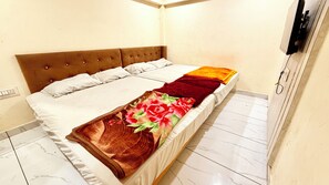 Superior Quadruple Room | Premium bedding, desk, laptop workspace, soundproofing