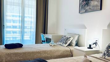 2 habitaciones, tabla de planchar con plancha y wifi gratis