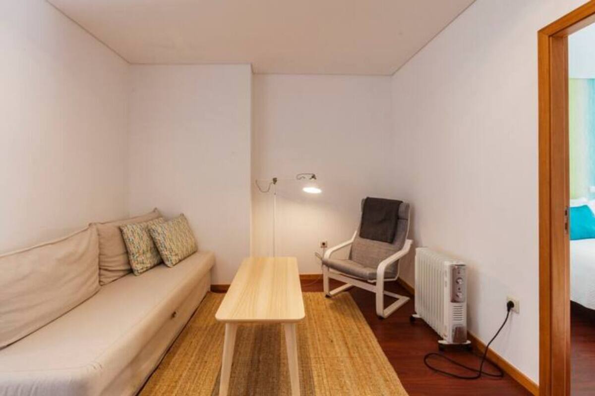 Apartment (Two-Bedroom Apartment) | Desk, laptop workspace, iron/ironing board, bed sheets