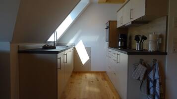 Réfrigérateur, four, plaque de cuisson, lave-vaisselle