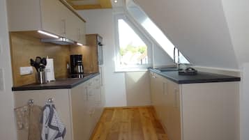 Réfrigérateur, four, plaque de cuisson, lave-vaisselle