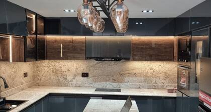 Rare 2bed Luxury guest house with private garden and pool table close to airport