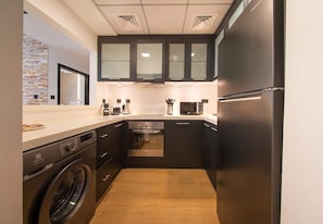 Coffee/tea maker, fridge, microwave, oven