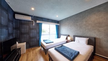 Quarto duplo, para não fumantes | Cofres nos quartos, escrivaninha, cortinas blackout, Wi-Fi de cortesia