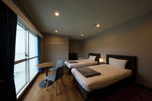 Quarto duplo superior, para não fumantes | Cofres nos quartos, escrivaninha, cortinas blackout, Wi-Fi de cortesia