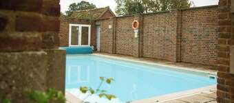 Long House is a Grade II listed family home set in 5 acres of garden and park.