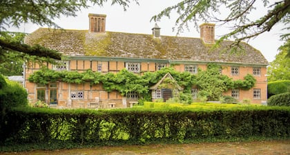 Long House is a Grade II listed family home set in 5 acres of garden and park.