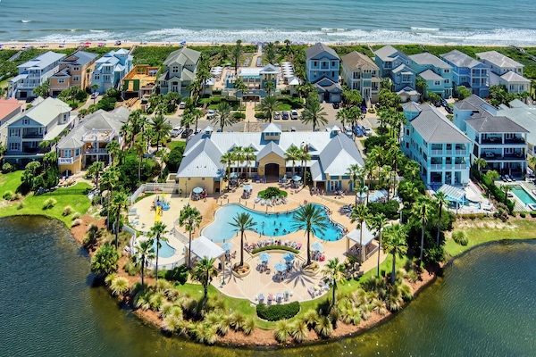 🏖️🌴 Resort-style paradise at Cinnamon Beach! Spend your days poolside at the oceanfront clubhouse—featuring a huge zero-entry pool, kids’ splash area, plenty of loungers, and direct beach access just steps away. 🌊☀️