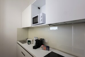 Deluxe Studio, Balcony, Partial Sea View | Private kitchen | Fridge, stovetop, cookware/dishes/utensils