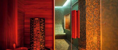 A sauna room with a wooden interior, a sauna bench, and a tiled shower area.