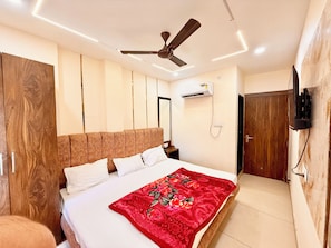 Premium bedding, desk, laptop workspace, soundproofing