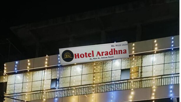 Hotel Aradhna with balconies and string lights. - HOTEL ARADHANA (Veraval)