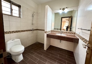 Separate tub and shower, slippers, towels