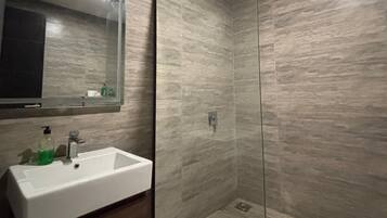 Shower, bidet, towels, soap