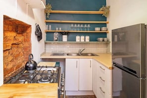Refrigerador, horno, parrilla de estufa y tostadora 