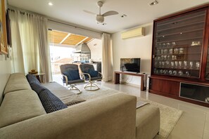 Living room - Apartamento Enseada 32 (Guarujá)