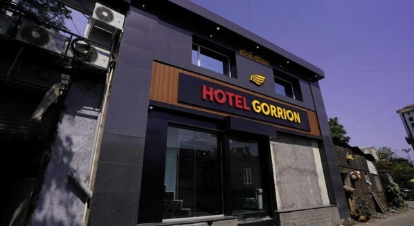 A modern hotel named Hotel Gorrion with a prominent sign. - Hotel Gorrion (Mumbai)