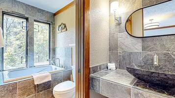 Shower, towels, soap, toilet paper