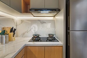 Vila, 3 quartos, vista para a piscina | Cozinha privada | Geladeira grande, micro-ondas, cooktop, torradeira