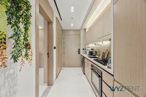 Standard Apartment, Balcony, Pool View | Private kitchen | Full-size fridge, microwave, oven, stovetop
