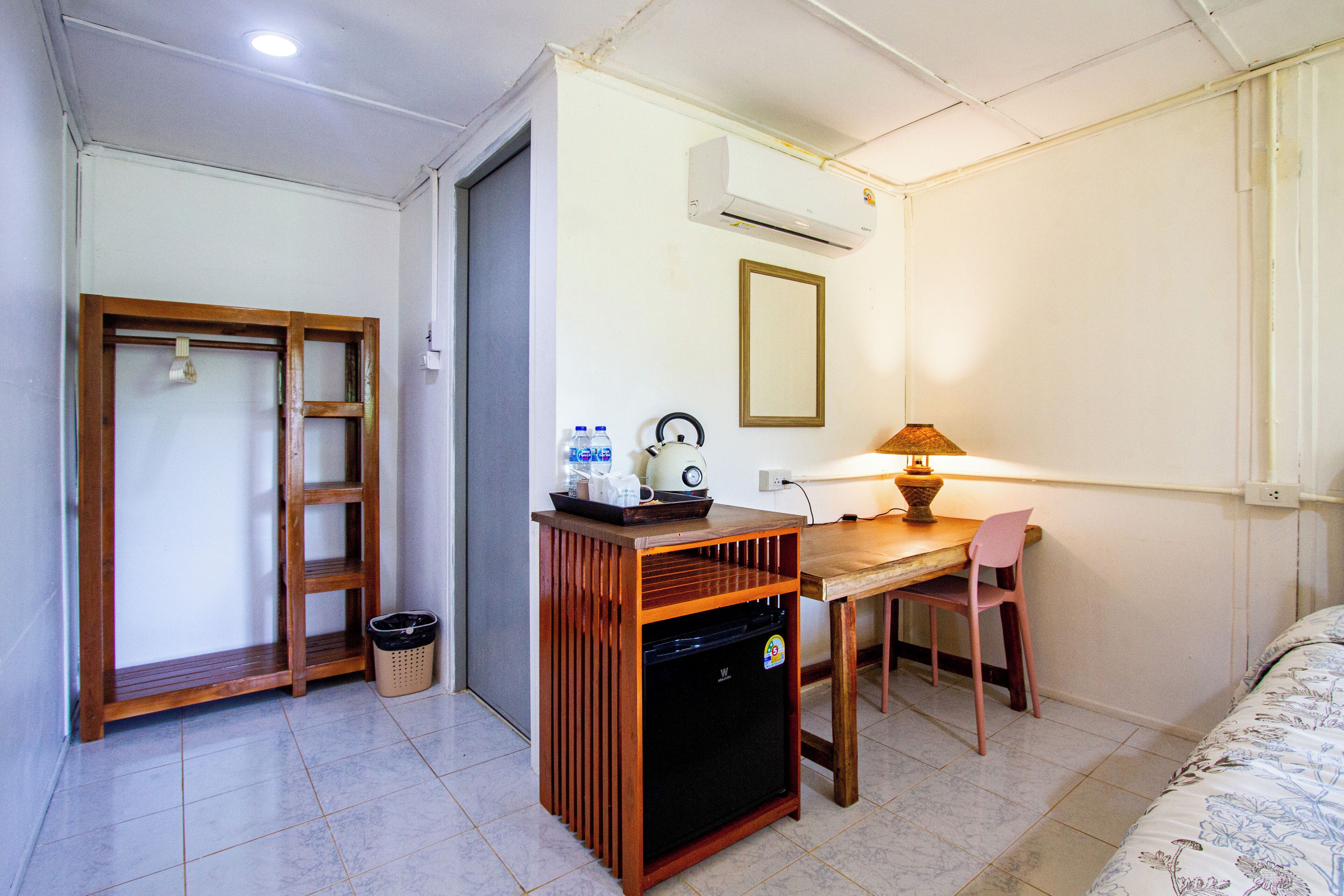 Deluxe Room, Balcony, Garden View | Air conditioning