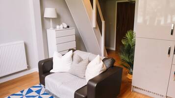 Apartamento, 1 quarto, para não fumantes | Área de estar