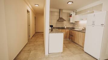 Deluxe Apartment, 2 Bedrooms, Balcony, City View | Private kitchen | Coffee/tea maker, electric kettle