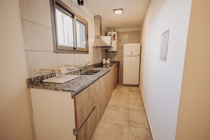 Deluxe-lejlighed - 1 soveværelse - balkon - byudsigt | Privat køkken | Kaffe-/temaskine, elkedel