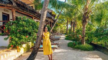On the beach, white sand, beach towels