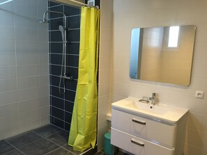 Shower, towels, soap, toilet paper