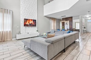 Télévision, cheminée, jeux vidéo