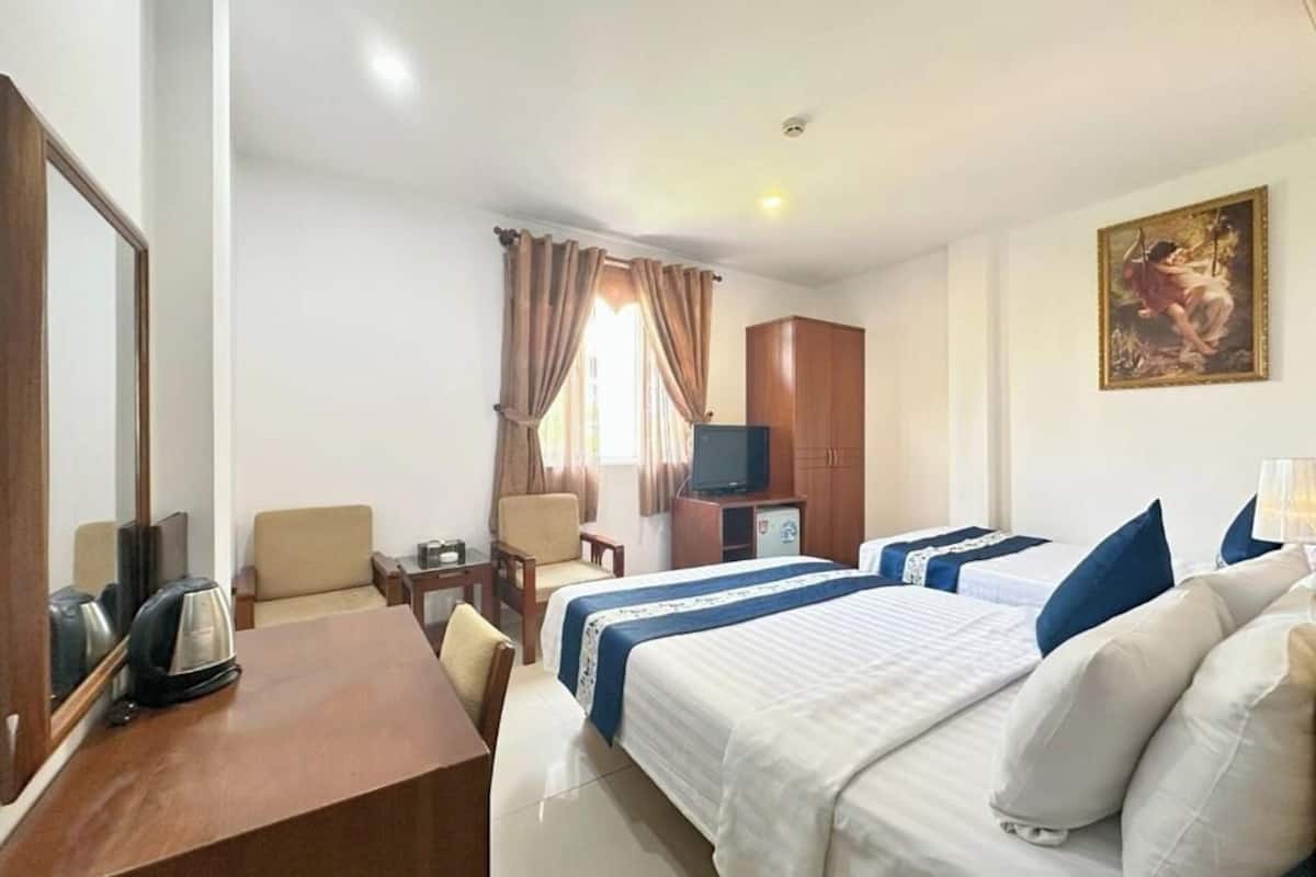 Quarto casal ou duplo luxo, vista para a cidade | Wi-Fi de cortesia
