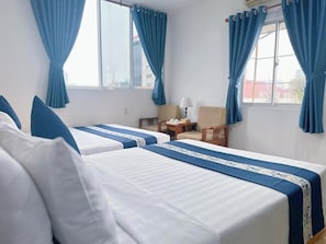 Quarto casal ou duplo luxo, vista para a cidade | Wi-Fi de cortesia