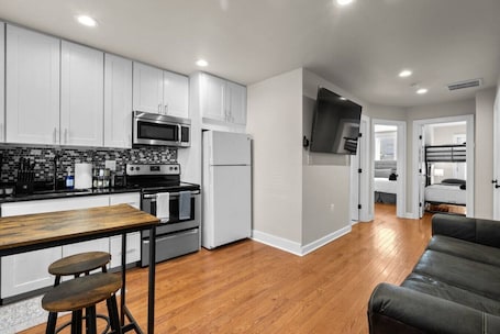 Fridge, microwave, oven, stovetop. Private City Condo+ 2BD+1Bath+Free Street Parking