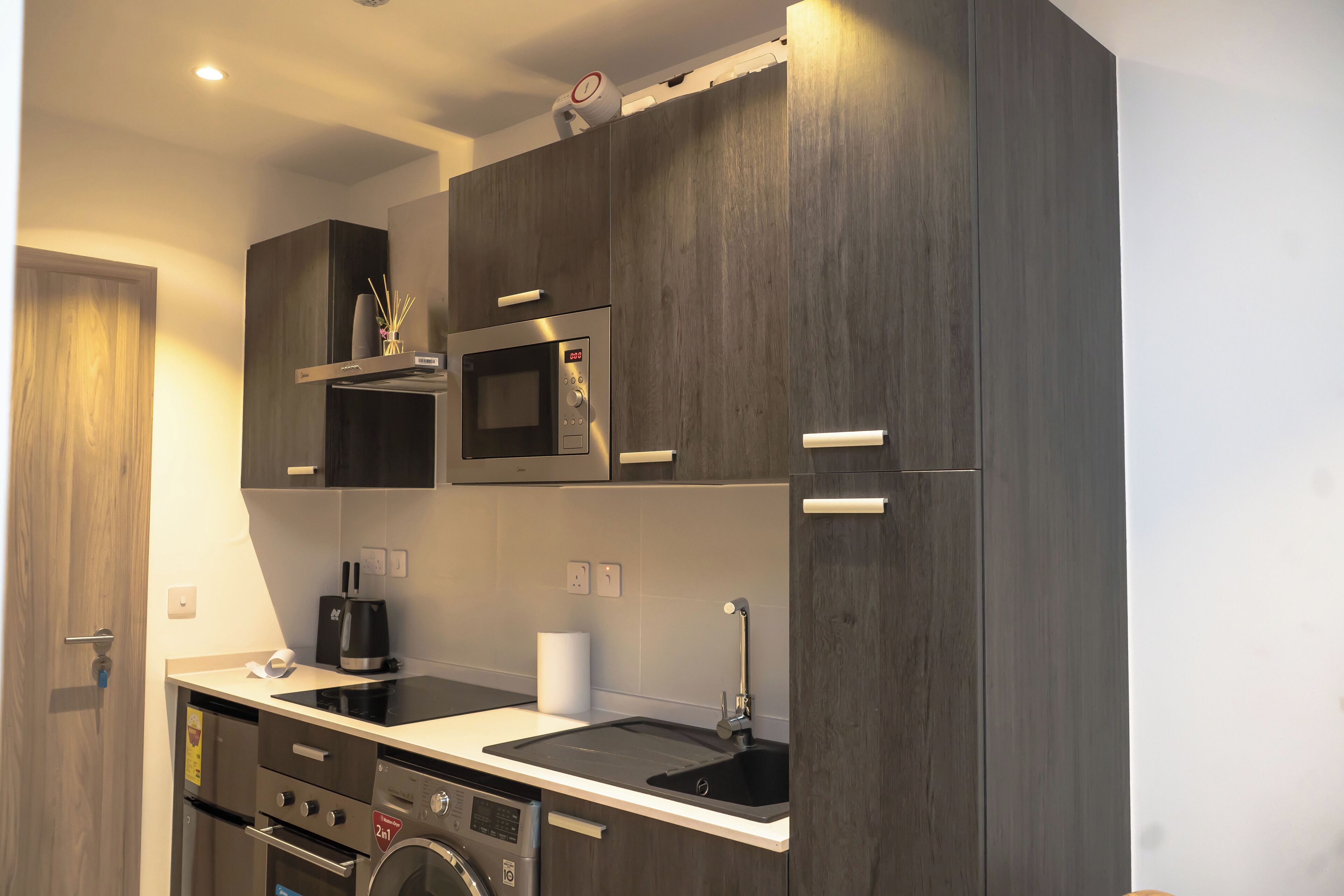 Mini-fridge, microwave, oven, stovetop