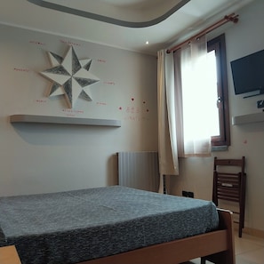 Appart'hôtel, plusieurs lits | Rideaux occultants, Wi-Fi gratuit