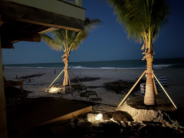 On the beach, sun loungers, beach towels